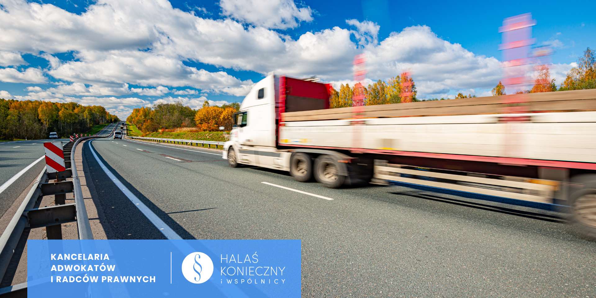 Blurred white semi-truck speeding on a highway with autumn trees and a blue law-firm banner in the lower left corner.